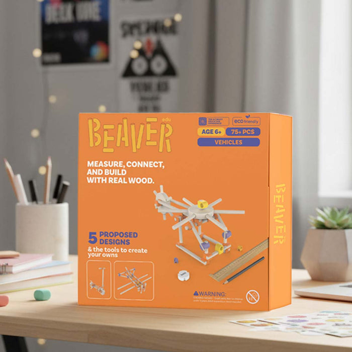 Beaver wood building kit packaging on a table with a blurred background
