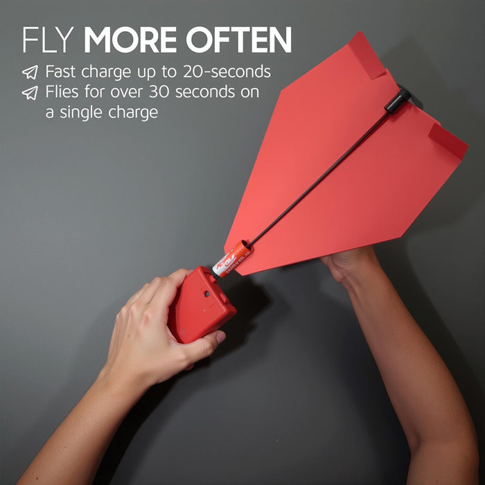 Power Up Red paper airplane with a device attached, held by hands against a gray background.