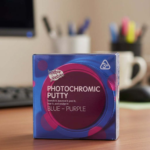 Box of Photochromic Putty with a blurred office background