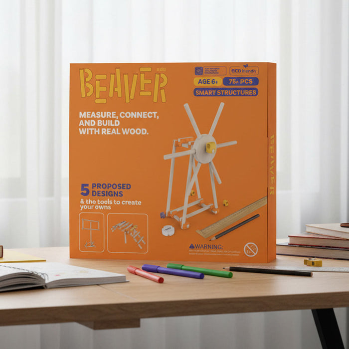Beaver smart structures kit packaging on a table with markers and books