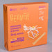 Beaver building kit box in bright orange, showing the product packaging with a white wooden beaver structure and purple text on a light gray background.