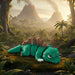 Toy dinosaur lying on a grassy patch with a volcanic landscape in the  backgroundof Heebie Jeebies